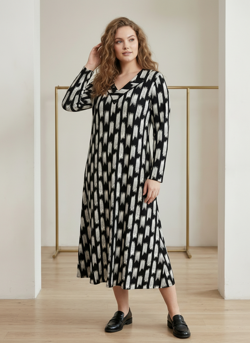 ΦΟΡΕΜΑ PLUS SIZE ΜΕ ΑΦΗΡΗΜΕΝΟ ΣΧΕΔΙΟ