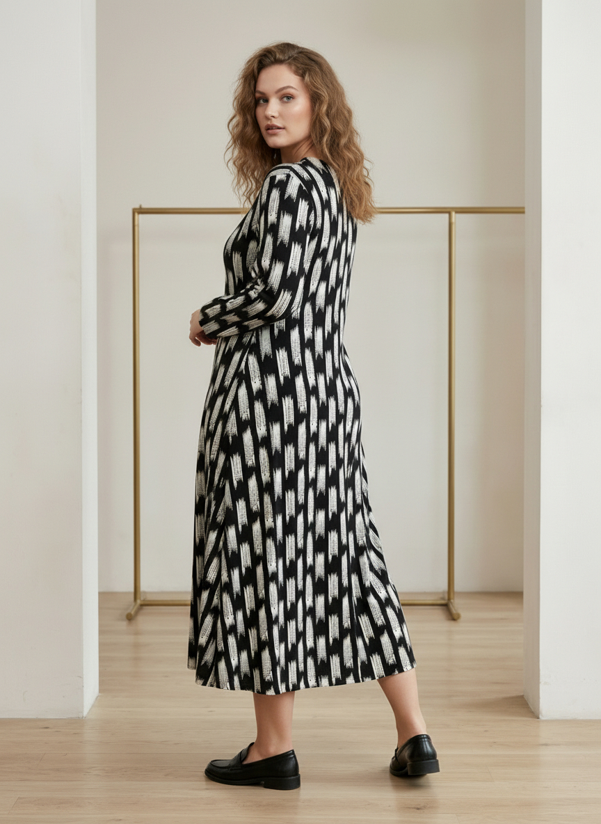 ΦΟΡΕΜΑ PLUS SIZE ΜΕ ΑΦΗΡΗΜΕΝΟ ΣΧΕΔΙΟ